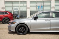 Passenger Illuminated Visor Mirror,Traction Control,Heated Mirrors,Pass-Through Rear Seat,Power Stee... (image 5)