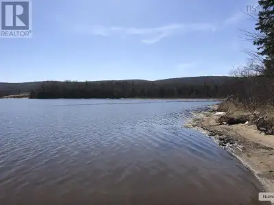 A 3.6 - acre registered building lot with 185 feet of sandy saltwater frontage on the River Denys Ba...