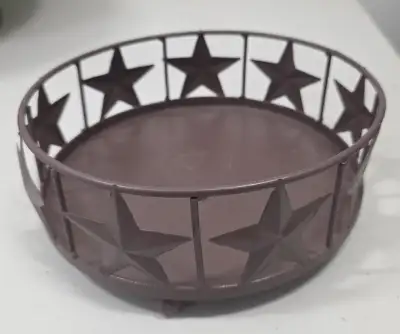 Add a touch of country charm to your home with this decorative metal tray featuring a ring of emboss...