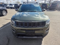 Experience confident adventure with the 2021 Jeep Compass North in striking blue, designed for those... (image 1)