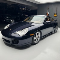 Check out this 2003 Porsche 911 Twin Turbo. This is the very desirable Midnight Blue Metallic with N... (image 1)