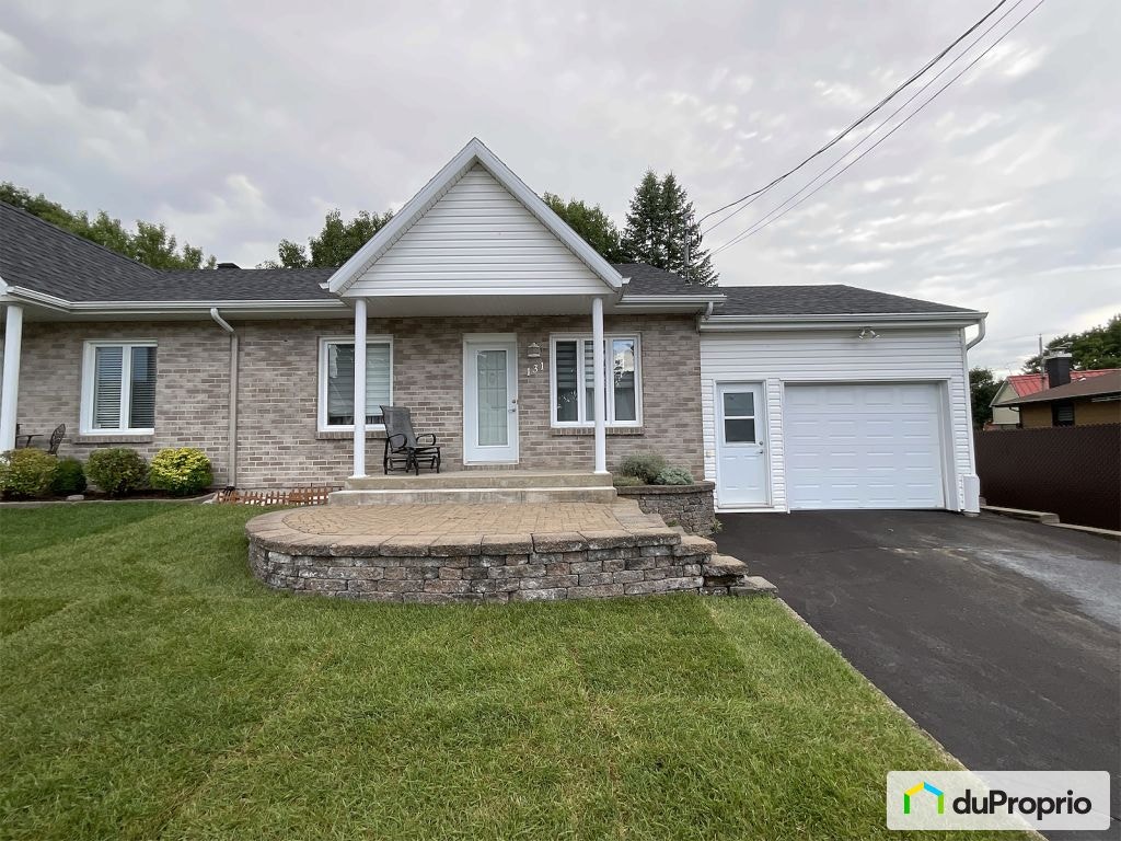 $434,500 - Semi-detached for sale in St-Redempteur — photo 1