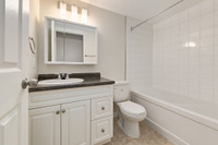 Amenities: Air Conditioning • Spacious Rooms • Heat & Water Included Suite & Building: Bachelor, one... (image 6)