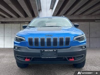 Conquer any terrain with this stunning 2022 Jeep Cherokee Trailhawk, finished in a captivating Hydro... (image 1)