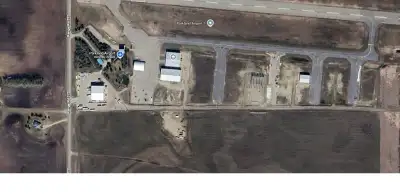 Choice of (2): # 7 and # 8 undevelopped hanger lots. Lot 7-0.6 Acres (26,136SF) @ $22/SF - $574,999....
