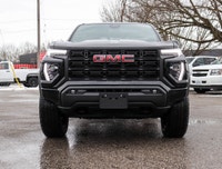 Meet the 2026 GMC Canyon Elevation Crew Cab Short Box 4-Wheel Drive Elevation, a black powerhouse re... (image 1)