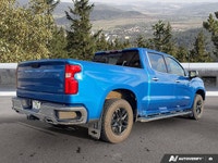Command the road and conquer any task with this robust Blue 2024 Chevrolet Silverado 1500 LTZ. Equip... (image 4)