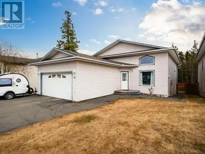 Welcome to 13 Black Bear Lane in Copper Ridge! A stunning 4-bedroom (plus den), 3-bathroom home that...