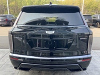The 2026 Cadillac Vistiq 1SH, finished in elegant Stellar Black Metallic with a Jet Black interior,... (image 7)