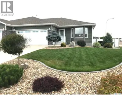 If an immaculate bungalow-style condo is what you’ve been searching for, look no further—this except...