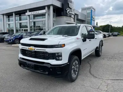 The 2026 Chevrolet Silverado 2500HD Custom in a striking white hue is a powerhouse of performance wi...