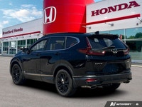 Discover refined adventure in this remarkable 2020 Honda CR-V Touring. Celebrated for its superb saf... (image 3)