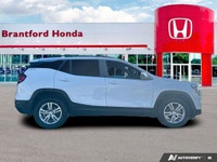 Elevate your daily drives with this impressive white 2023 GMC Terrain SLE Sport Utility, showing jus... (image 6)