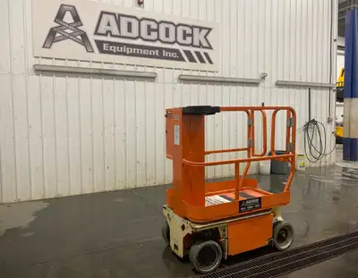 USED 2015 JLG 1230ES ELECTRIC PERSONNEL SCISSOR LIFT IN STOCK in EDMONTON, AB WE SHIP ANYWHERE in CA...