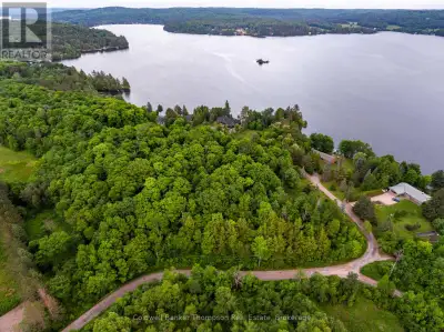 Discover the perfect canvas for your dream home or off-water cottage at 210 Allisons Point Rd. This...
