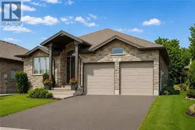 Custom-built by award-winning Keating Construction, this meticulously maintained and spotless bungal...