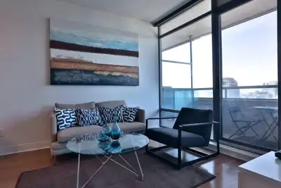 Quixotic is a 650-square-foot condominium located on Yorkville Avenue. This unique apartment feature...