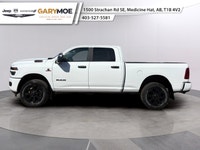Introducing the 2026 Ram 2500 Big Horn 4x4 Crew Cab with a 64 Box in a vibrant white exterior paired... (image 4)