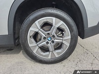 This 2025 BMW X1 xDrive28i comes equipped with a 7-speed dual-clutch automatic transmission, xDrive... (image 9)