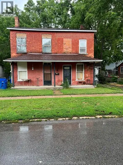 Attention Investors, are you looking for a project to renovate. This brick duplex on a large lot has...
