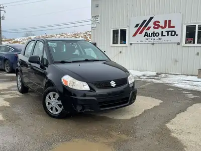 AUX Alberta Active Keyless Entry 2010 Suzuki SX4 213,190 KMs 2.0L 4cyl engine The Suzuki SX4 has bla...