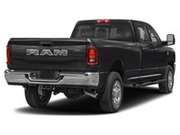 The 2026 Ram 3500 Tradesman 4x4 Crew Cab with an 8' Box in stunning black offers unmatched power and... (image 1)