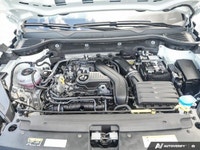 This 2024 Volkswagen Taos Trendline SUV comes equipped with cloth seats, heated seats, plus convenie... (image 9)