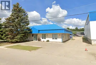 Located in Riverside Light Industrial Park, this 11,206 SF standalone building is available for sale...