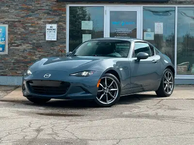 This MX‑5 RF GT comes with a 6‑speed manual transmission and an automatic retractable hardtop! This...