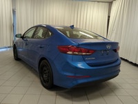 Finished in a confident Blue exterior with a clean Black interior, this pre-owned 2018 Hyundai Elant... (image 5)
