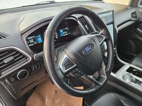 APPLY FOR FINANCING AND SHOP ONLINE 24/7 AT WWW.BANNISTERGPKIA.CA! Experience the 2023 Ford Edge SEL... (image 9)