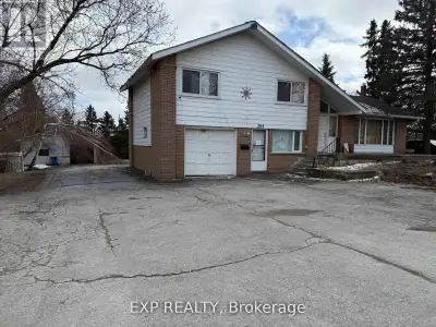 Opportunity Awaits in the Heart of Beautiful Orangeville! Huge 98.74 x 301.91 Foot Lot approximately...