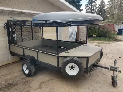 Rebuilt utility trailer w/cargo box, pipe rack, and 1000lb crane Rebuilt and modified 5x10 trailer....