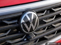 Experience sophisticated style and robust performance with this striking red 2024 Volkswagen Atlas E... (image 8)