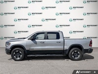 Experience the power and capability of the rugged 2020 Ram 1500 Rebel 4x4 Crew Cab 5'7 Box, availabl... (image 2)