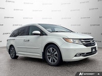 Simplify family journeys with the 2016 Honda Odyssey Touring. This white minivan, with 157,038 kilom... (image 8)