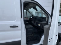 Focused on practicality and economy, this Ford Transit is a strong contender in the work van market.... (image 9)