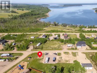 This lakeview lot on Lac Des Iles Lake in Lauman's Landing Subdivision is ready for your RV or park...