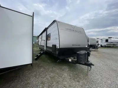 We are looking for good pre owned Rv's to buy or consign!! Keystone Hideout travel trailer 262BHS hi...