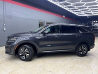 The 2023 Kia Sorento Hybrid LX in a sophisticated Gray finish is an AWD SUV designed for those who v... (image 1)