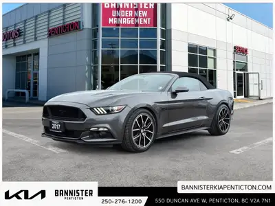 Experience the thrill of driving a 2017 Ford Mustang GT Premium Convertible in a stunning shade of g...