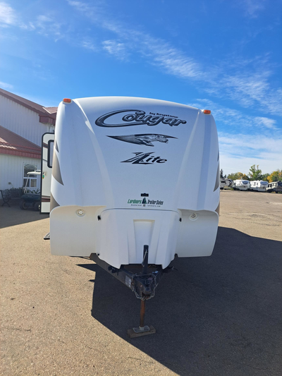 For sale: 2014 Keystone Cougar 28 RBS travel trailer with double-over-double bunks, perfect for fami...