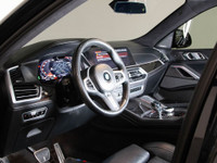 This 2020 BMW X6 M50i Coupe commands attention with aggressive styling, a powerful V8 engine, and re... (image 8)