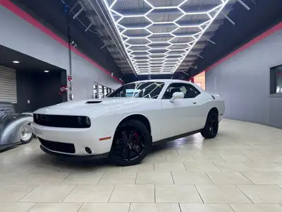 Experience the thrill of driving the 2020 Dodge Challenger SXT in stunning White. This RWD coupe bri...