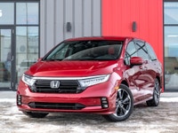 Carget Supercentre is proud to present this 2022 Honda Odyssey Touring! EXTERIOR: RADIANT RED INTERI... (image 1)