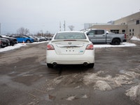 This 2014 Nissan Altima is powered by a smooth and efficient 2.5L four-cylinder engine paired with a... (image 6)