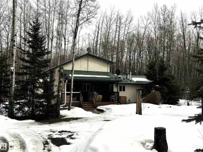 Set on 1.96 beautifully treed acres, this charming 1,245 sq. ft. home offers the perfect blend of co...