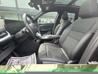 Experience the luxury of driving a black 2023 BMW X1 xDrive28i Sports Activity Vehicle with its comp... (image 8)