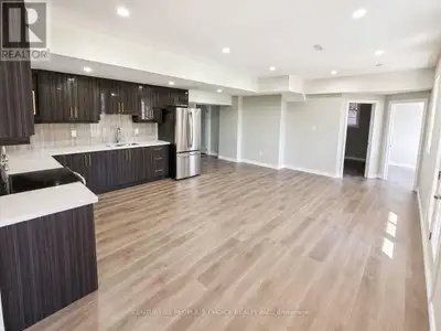 **4 Bedrooms** And **2 Full Bathrooms** In A **Fully Legal Walk-Out Basement** Situated On A **60 Ft...