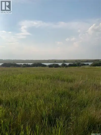 Waterfront Living at Blackstrap Lake, 1 Acre Lot in Blackrock - a serene and private community nestl...